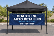 Custom vinyl banner displayed on a pop-up canopy tent